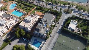 an overhead view of a house with two swimming pools at Residence Ada in Grottammare