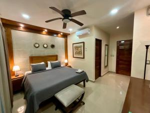 Postel nebo postele na pokoji v ubytování El Zaguán Colonial by GuruHotel