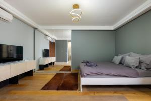En eller flere senger på et rom på 3bedroom triplex rooftop apartment