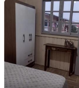 Lova arba lovos apgyvendinimo įstaigoje Micro casa da Cléo