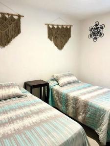 Postel nebo postele na pokoji v ubytování Departamento moderno en Guadalajara