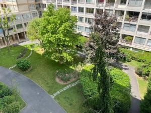 an overhead view of a garden in a building at Superb flat with iconic Eiffel tower view in Paris