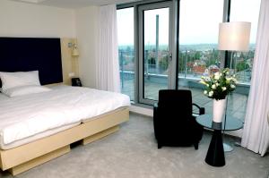 Posteľ alebo postele v izbe v ubytovaní Hotel Erwin Junker