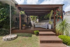 Zahrada ubytování Casa c piscina, churrasq e Wi-Fi, lazer completo