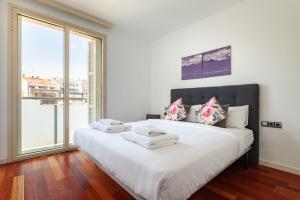 Postel nebo postele na pokoji v ubytování Plaça Catalunya Modern 2bedroom with balcony