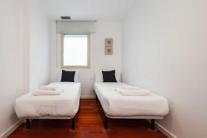Postel nebo postele na pokoji v ubytování Plaça Catalunya Modern 2bedroom with balcony