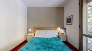 Posteľ alebo postele v izbe v ubytovaní Modern and bright three-bedroom in Eixample