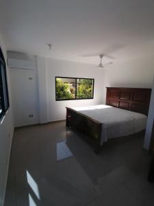 Ένα ή περισσότερα κρεβάτια σε δωμάτιο στο Apartamentos JGB
