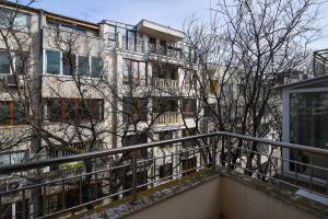 a balcony in front of a building at Central Area Retreat AC & WiFi in Varna City
