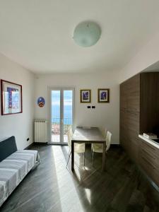 Giường trong phòng chung tại Creuza de Cinque Terre Apartment