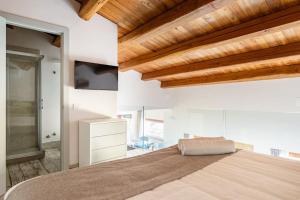 En eller flere senger på et rom på Agrigento Luxury Suite Kandinskij