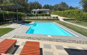 Swimmingpoolen hos eller tæt på Amazilia Guesthouse