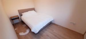 Postel nebo postele na pokoji v ubytování Apartman Studenjak