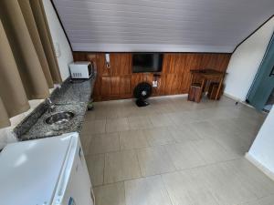 Kuchyň nebo kuchyňský kout v ubytování Espaço Chalé Cereja