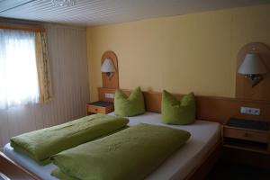 Postel nebo postele na pokoji v ubytování Ferienhaus Lila + 6 fotografií