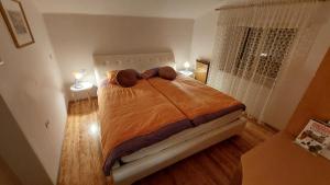 Säng eller sängar i ett rum på Vila Stančič