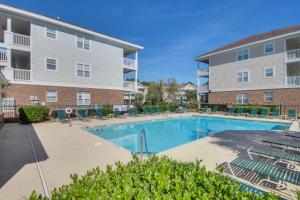 Πισίνα στο ή κοντά στο Barefoot Resort - Cypress Bend 123 - Windy Hill