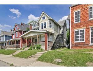 a group of houses in a residential neighborhood at Housepitality - The Franklinton Crown - Location in Columbus
