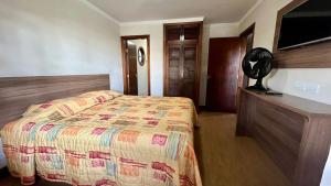Letto o letti in una camera di Hotel Varandas do Sol