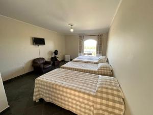 Letto o letti in una camera di Hotel Varandas do Sol