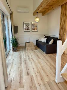 Ένα ή περισσότερα κρεβάτια σε δωμάτιο στο Cozy House