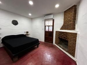 Postel nebo postele na pokoji v ubytování Departamentos MarCor