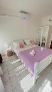 Кровать или кровати в номере Lovely apartments on the private Beach - island Korčula
