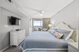 En eller flere senge i et værelse på Ashworth 807 - Ocean Front-Ocean Drive Section + 16 billeder