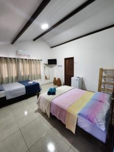 Postel nebo postele na pokoji v ubytování Flow Guest House