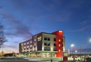 a building with a sign on the side of it at avid hotels Billings West, an IHG Hotel in Billings