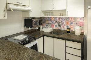 Η κουζίνα ή μικρή κουζίνα στο Apartamento com Vista para o Mar