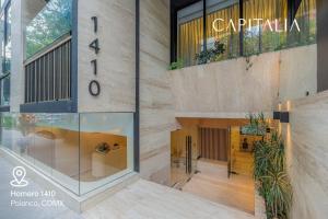 a view of the entrance to a building at Capitalia Palacio Polanco in Mexico City