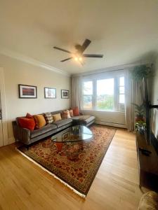 a living room with a couch and a table at Beautiful Chicago 2BD 1BA in Chicago
