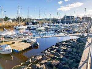 a group of boats docked in a marina at Flat 3, Barron House in Nairn