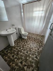 Ванная комната в Ruwanwali Resort