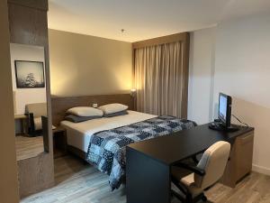 Кровать или кровати в номере Flat Paulista 540