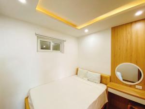 Giường trong phòng chung tại Mường Thanh Apartment Luxury Đà Nẵng