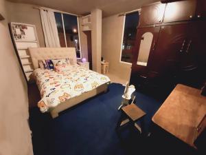 Llit o llits en una habitació de ENCALADA