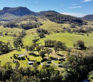 an aerial view of a park in the hills at Barrington Riverside Cottages in Barrington