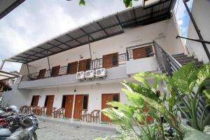 Μπαλκόνι ή βεράντα στο Bayang Brothers Residence By Occupied +9 φωτογραφίες