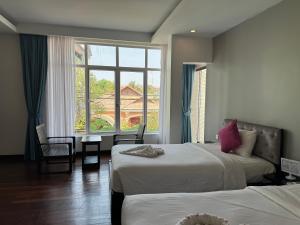 Postel nebo postele na pokoji v ubytování Hotel La Maravilla + 37 fotografií