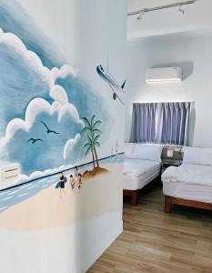 Postel nebo postele na pokoji v ubytování Yueli Homestay