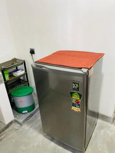 a small refrigerator with a counter on top of it at Villa 754 in Dickwella