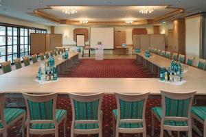 a large conference room with a large table and chairs at Landhotel Heimathenhof in Heimbuchenthal +58 photos
