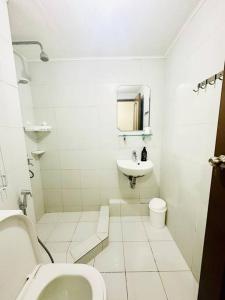 Un baño de One Oasis Cagayan de Oro - 3 days stay minimum