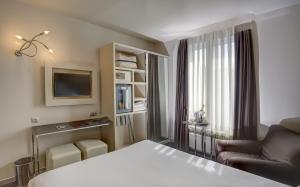 Un ou plusieurs lits dans un hébergement de l'établissement Hotel Vivaldi