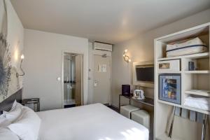 Un ou plusieurs lits dans un hébergement de l'établissement Hotel Vivaldi