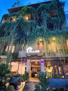 a building with a sign on the side of it at Ponte Boutique Da Nang in Da Nang