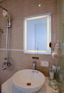 Koupelna v ubytování Keypad Hotel - 28 Dịch Vọng Hậu