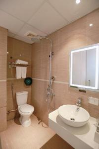 Koupelna v ubytování Keypad Hotel - 28 Dịch Vọng Hậu